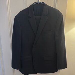 Men’s dark navy Michael Kors suit. Size 44R